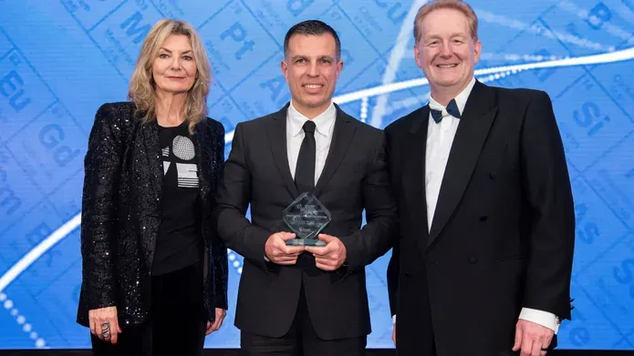 Dr Louigi Manfredi posing with his innovation-health technology award