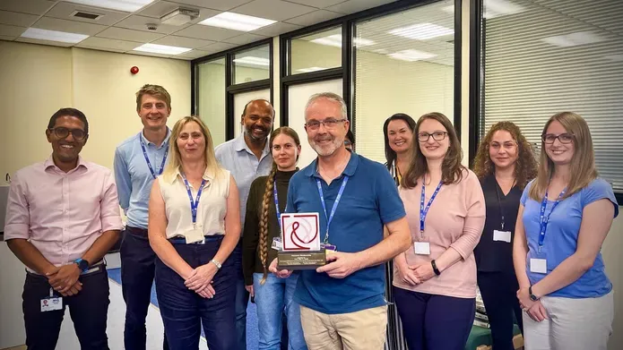 Professor Blair Smith and his team with the Honorary Life Membership of the Neuropathic Pain Group (NeuPSIG) award