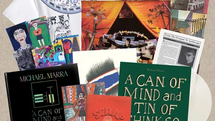 The contents of the boxset, including book, t-shirt and various notes and artwork