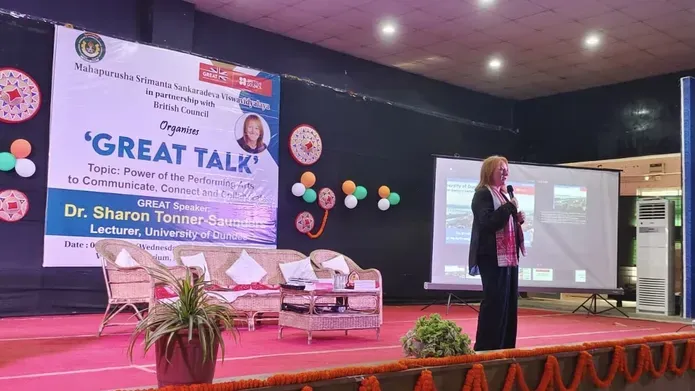 Woman giving speech on stage