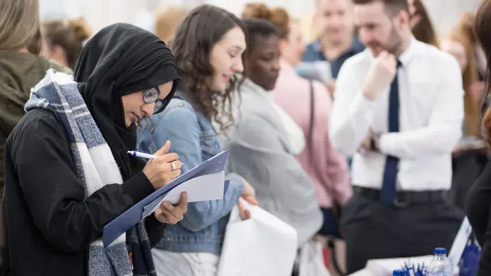 Prospective students at a University of Dundee recruitment event