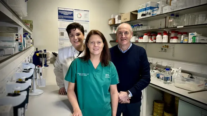Members of the School of Medicine fertility research team in a lab setting