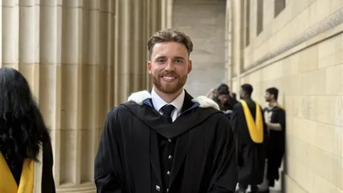 man in a graduation gown