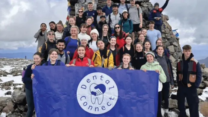 Dundee Dental Connect group holding a banner Dundee Connect