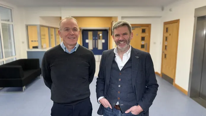 Professor Colin Fleming and Professor Michael MacDonald standing side-by-side, smiling