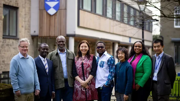 Members of the Ghanaian delegation with University staff outside of the Tower Building
