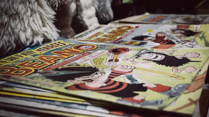 A selection of comics viewed at an angle