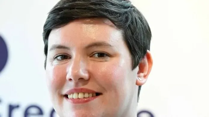 Picture of woman looking towards camera