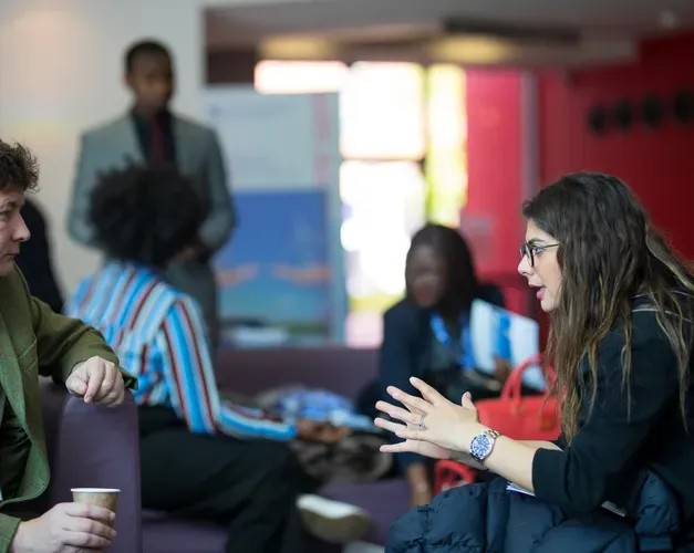 two people engaged in a conversation