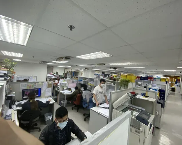 an office with desks and chairs