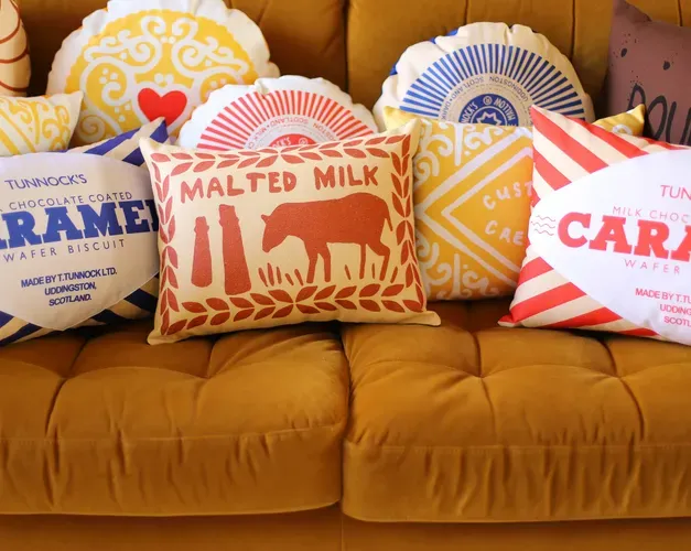 cushions that look like biscuits on a sofa