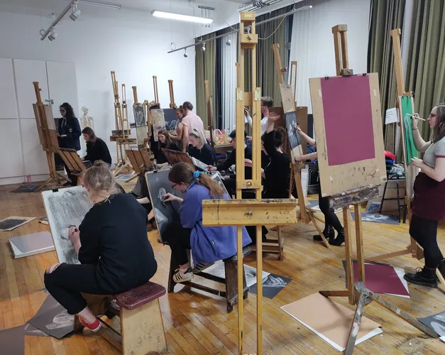 students working at easels
