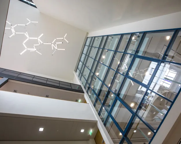 Life sciences building , looking up at windows from bottom floor 