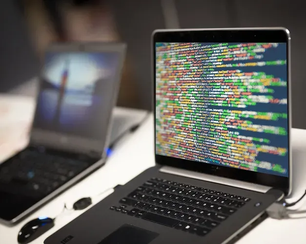 computer with data messages across the screen