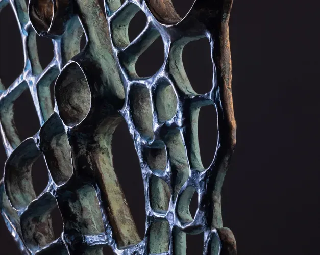Metal sculpture showcasing intricate design and craftsmanship