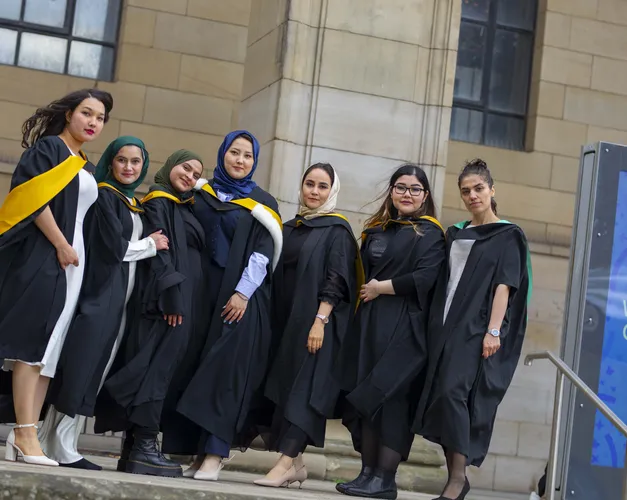 A group of women wearing academic robes at the University of Dundee's Winter Graduation