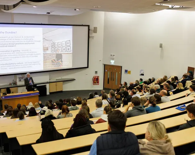 A lecture theatre full of people