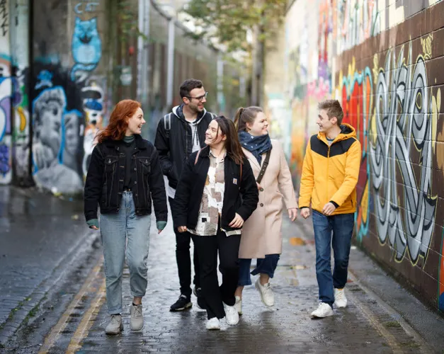 A group of students walking in the street