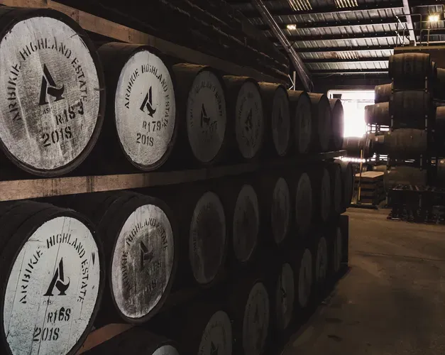 Whisky barrel storage room with a window