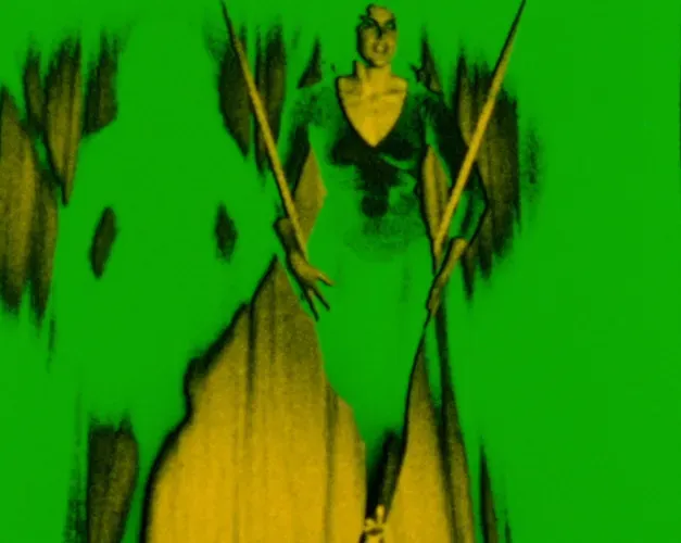 Neon green and yellow over saturated image of a trapeze artist mid-performance on a swing