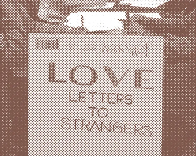 sepia toned photo showing a board with 'Love Letters to Strangers' written on it