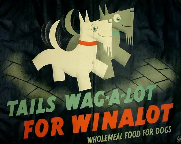 An illustrated advert for Winalot dog food, with the tag line " Tails wag a lot for winalot". Two cartoon Westie breed dogs ar shown above the tagline.