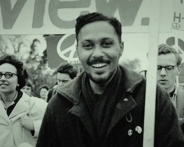 Black and white photograph of Stuart Hall on a CND march