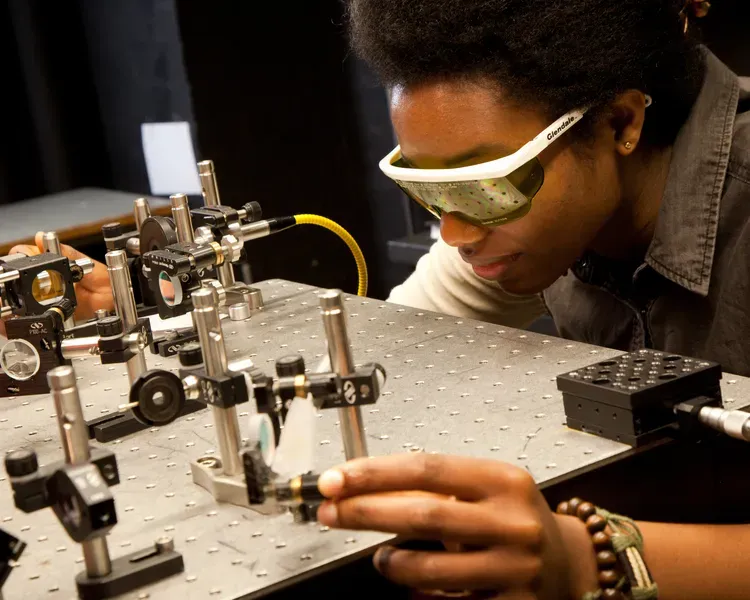 A student working on equipment