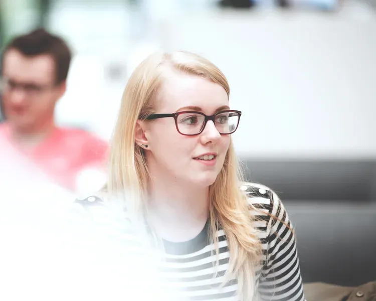 Student walking thru campus