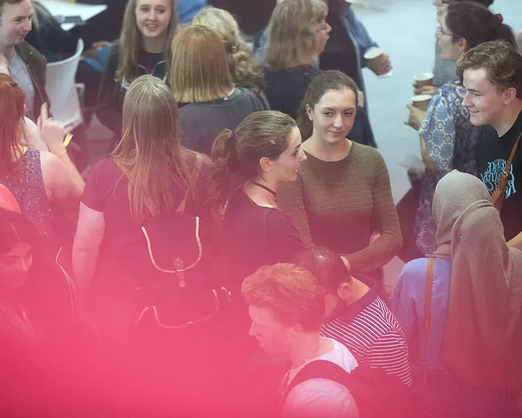 student talking at an event