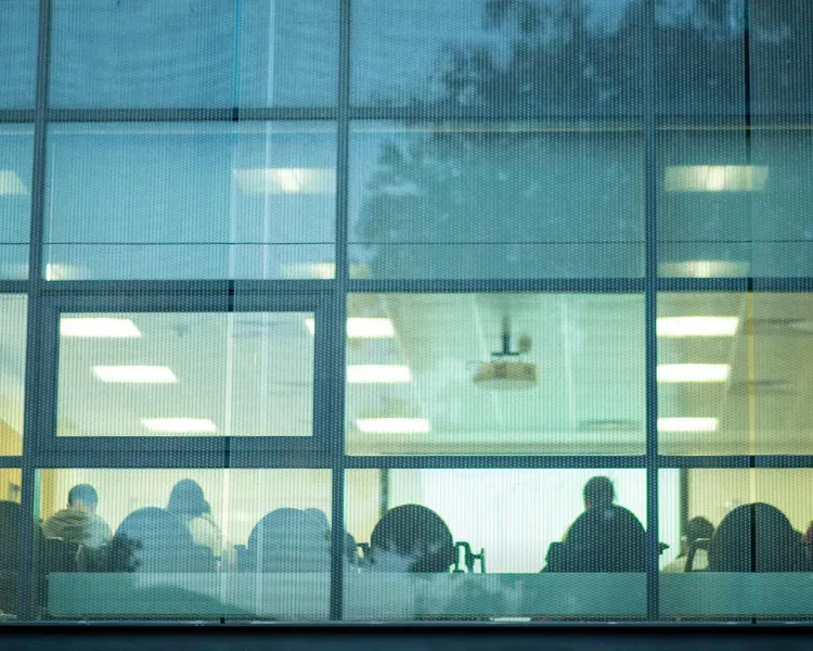 A view into a campus classroom from the outside