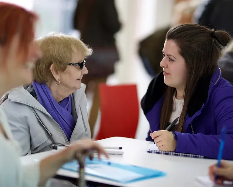 Student working with the public