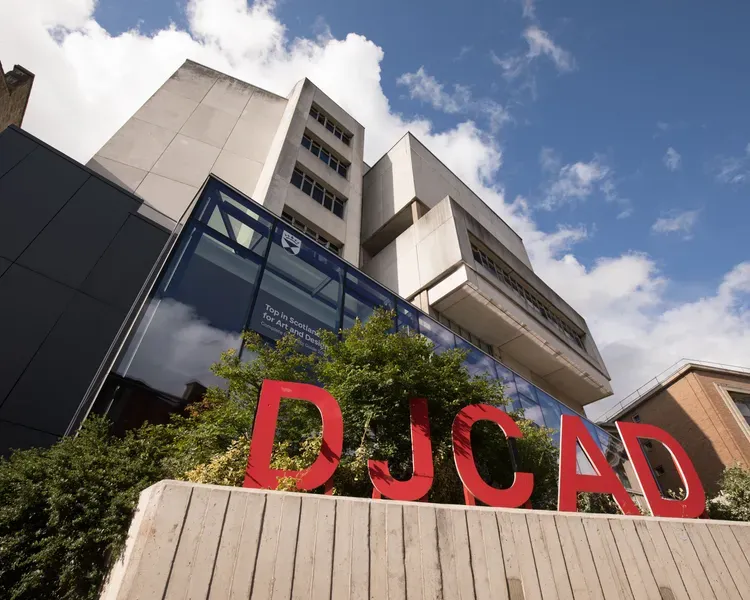 Front of DJCAD building with letters DJCAD