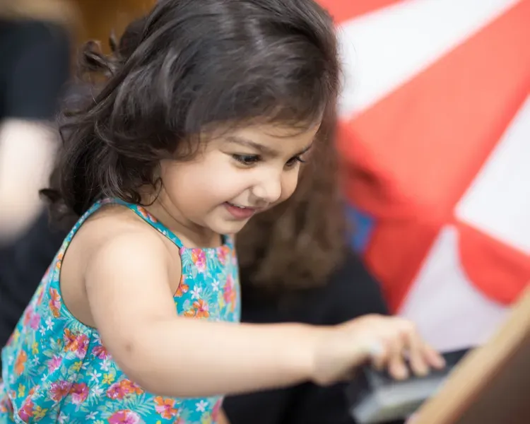 Little girl using a tablet