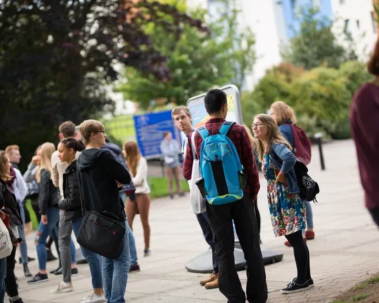 students walking on campus