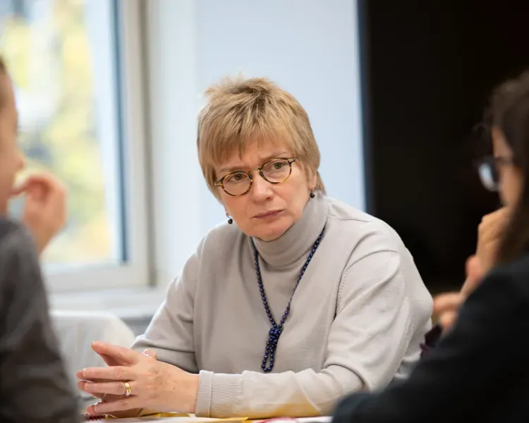 students sitting at a table together