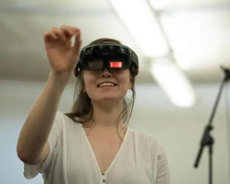 a student with a virtual reality headset on 