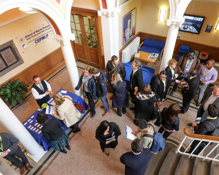 looking down on attendees at the mining conference in the CEPMLP building