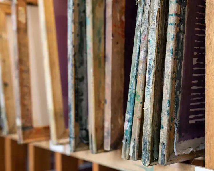 textile boards on a shelf