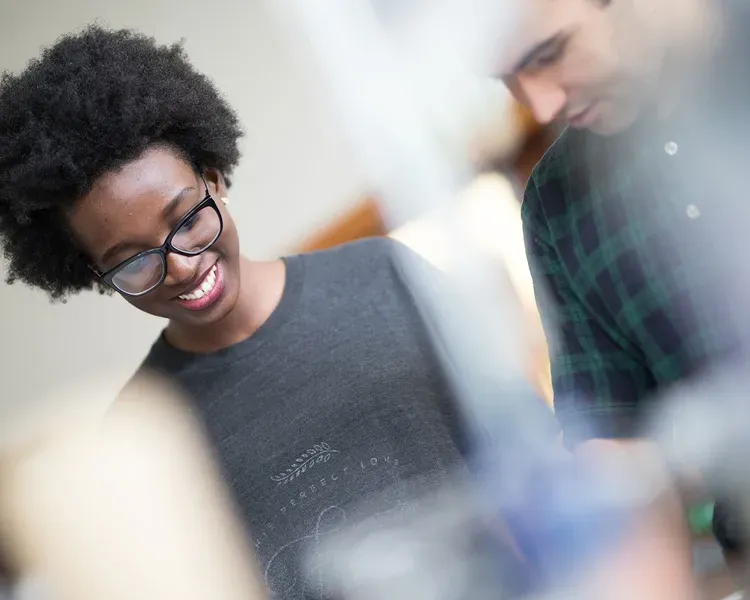 Photo of students working together