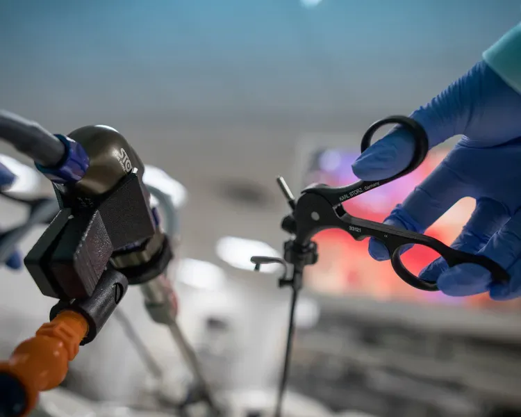 a surgeon using keyhole technology 