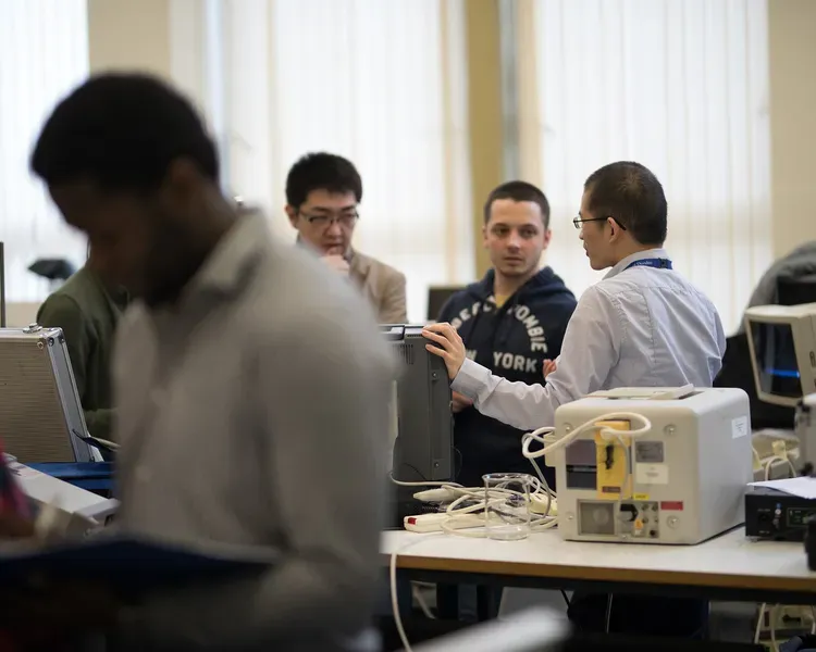 Academic with students