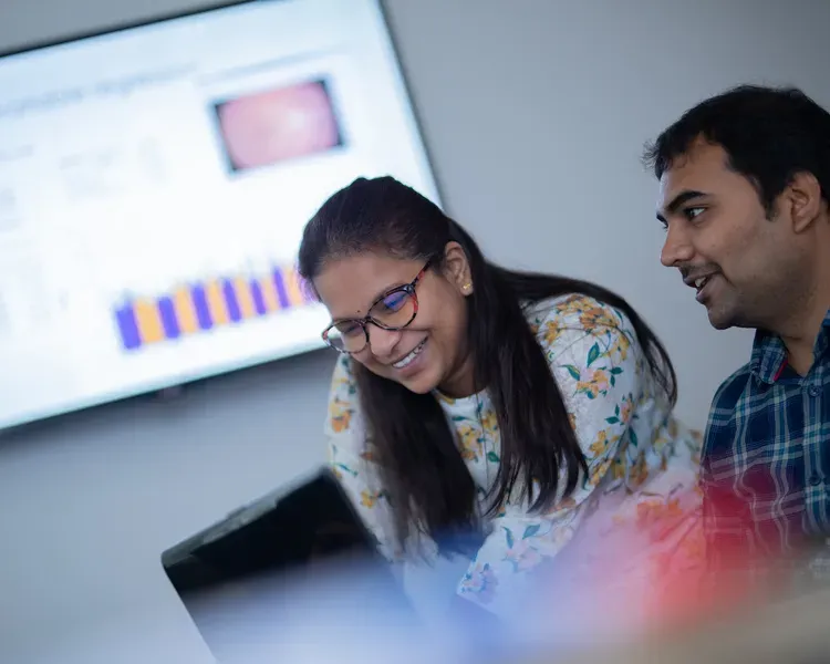 Postgraduate researchers working together