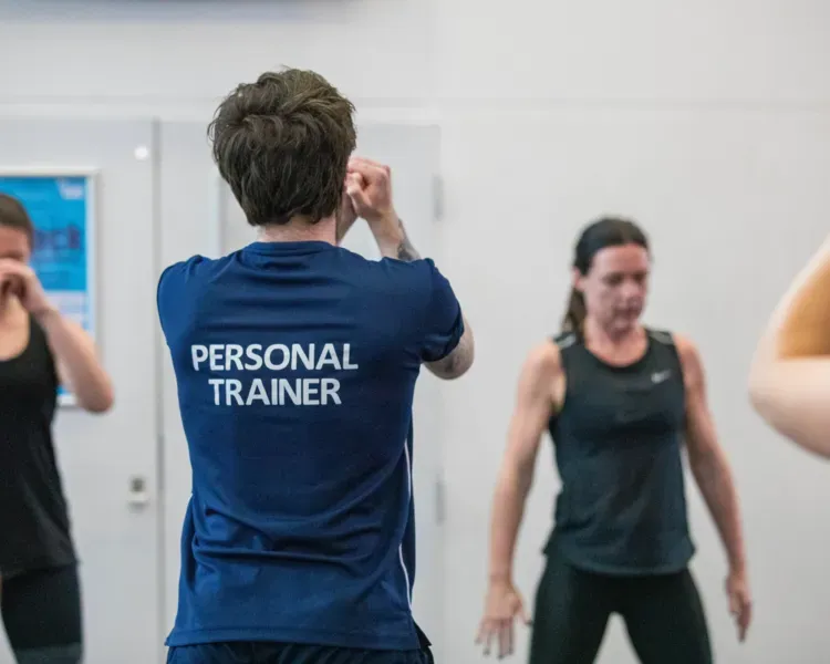 A personal trainer conducts a class at the Institute of Sport and Exercise