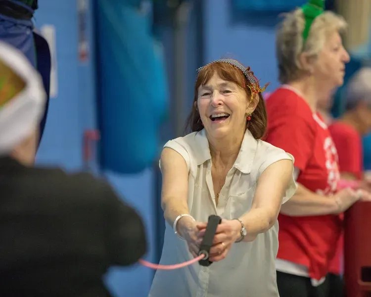 Participant takes part in an Active Living Seniors exercise class.