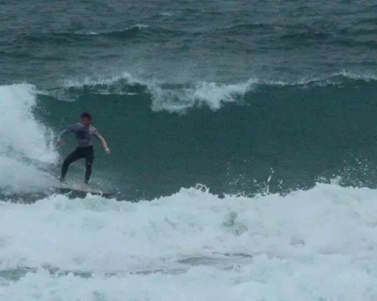 student surfing