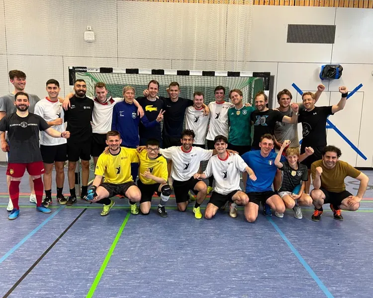 Futsal team group photo in a gym