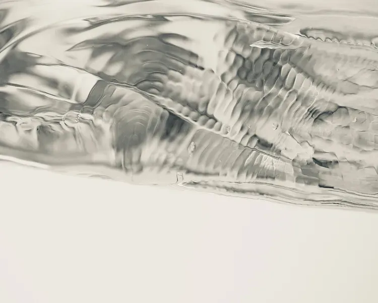 Molten glass unfolded into its own material agency, thereby becoming a wrinkled liquid form. Represented in photographic form