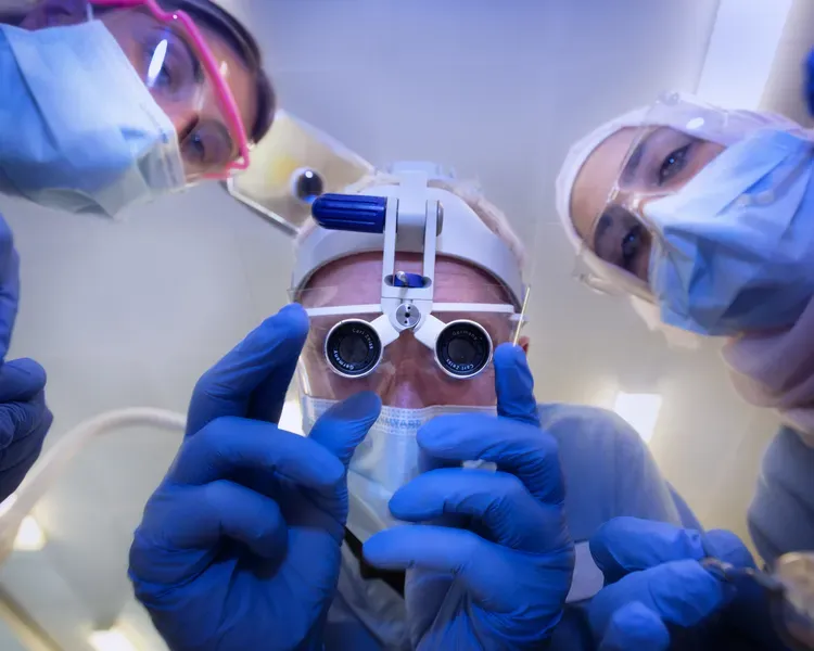 a group of people wearing masks and goggles