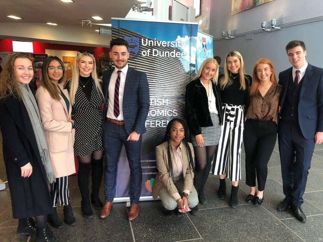 people standing smiling